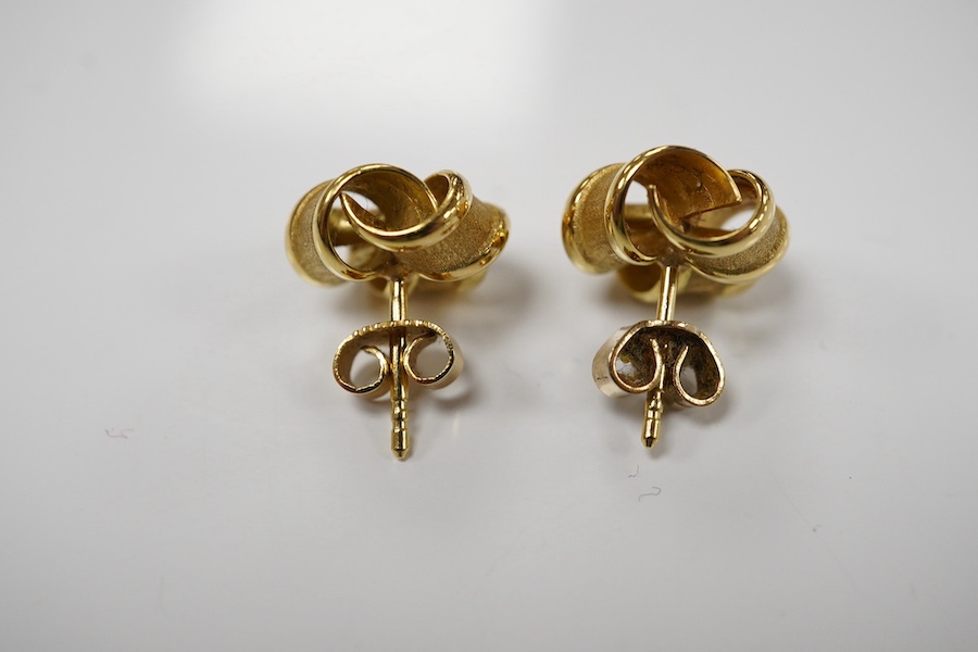 A pair of 18ct yellow gold stud earrings of knotted design with a textured finish, 1.1cm diameter each, post fittings, British hallmarks, gross weight 3.5 grams